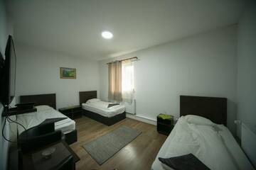 Фото номера Трехместный номер Мотели Napsugár panzió г. Lunga 5